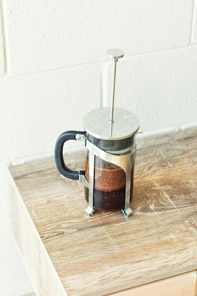 French press on a wooden table